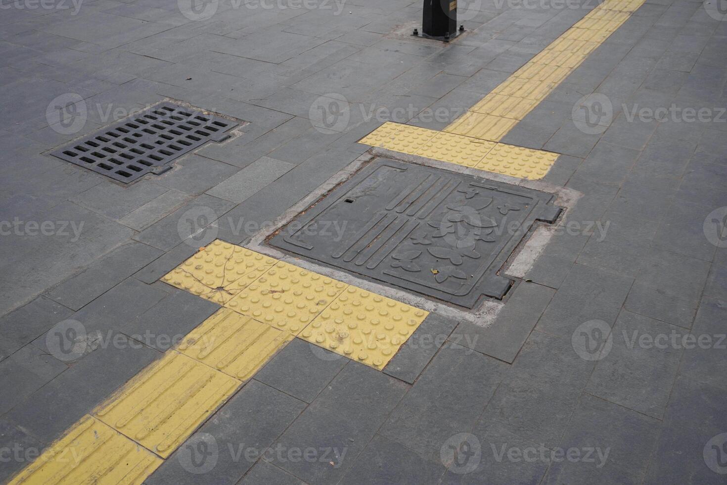 pedestrian paths or footpaths that are blocked by drainage areas photo