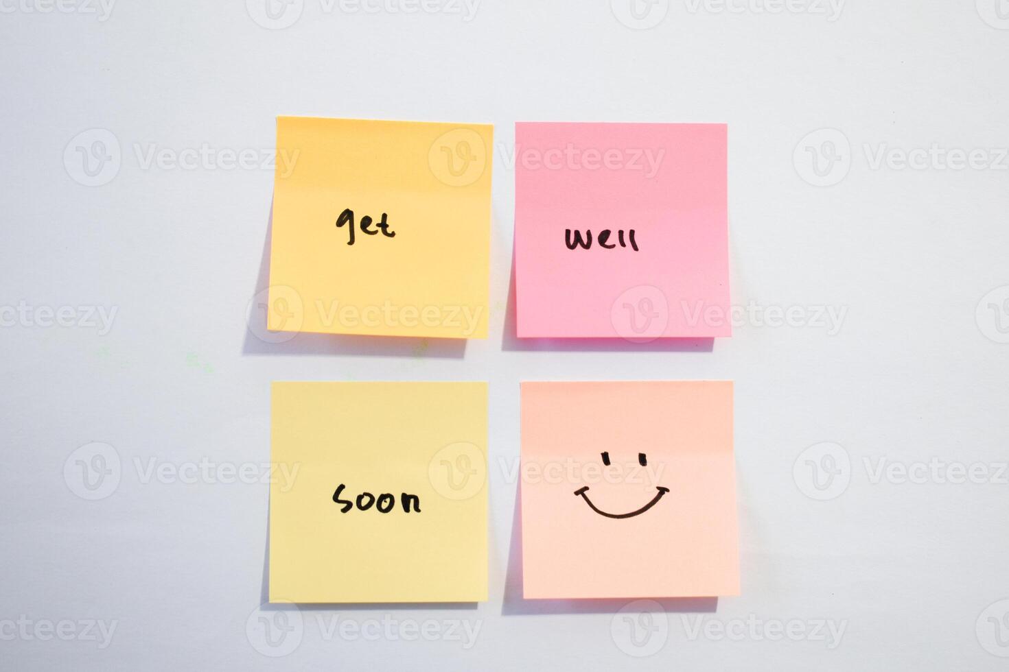 Get well soon on sticky notes. Motivational for personal development, inspirational handwriting. Isolated background photo
