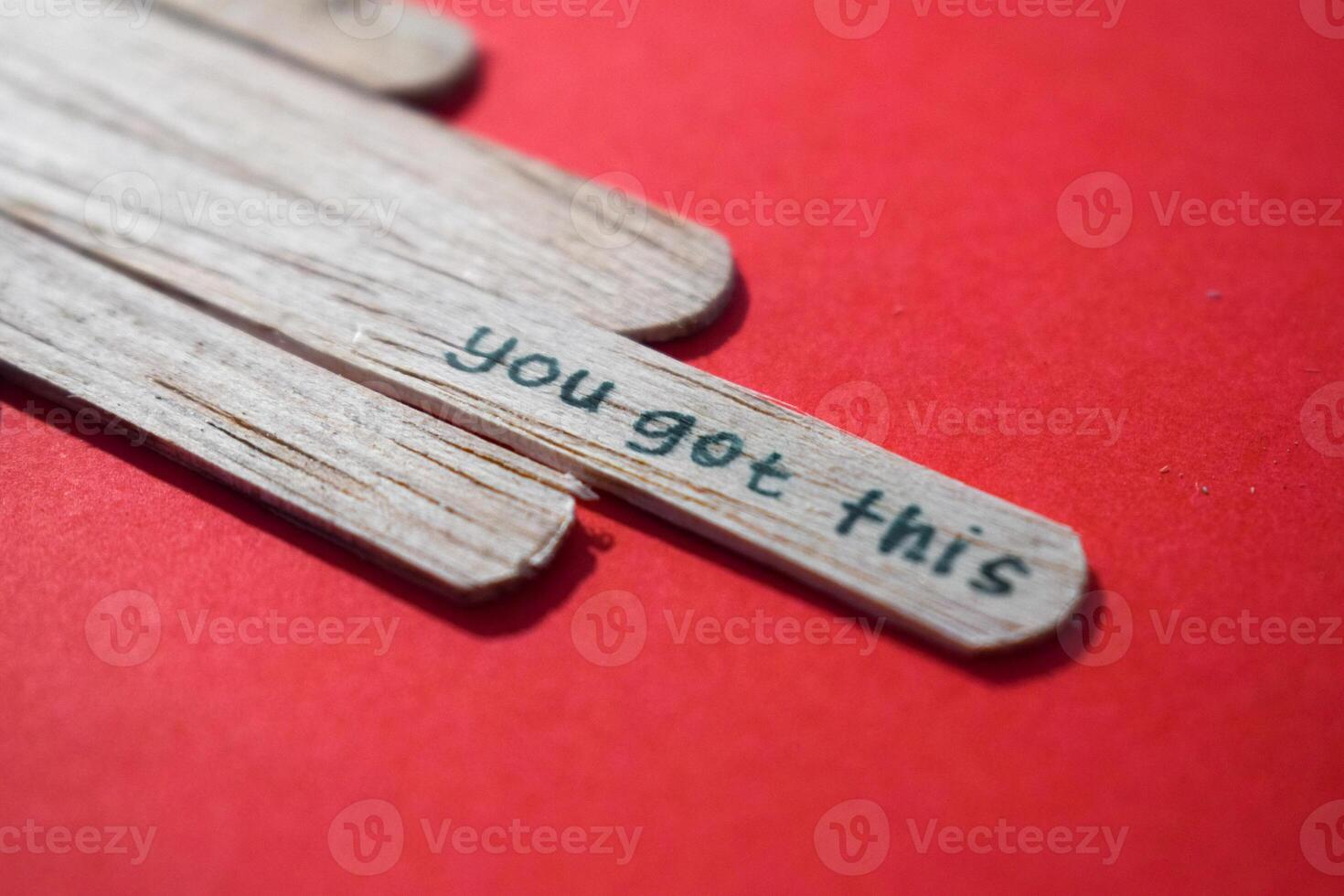 stick of ice cream with the words you got this. Motivational quotes, optimism, positive words. Isolated on background photo