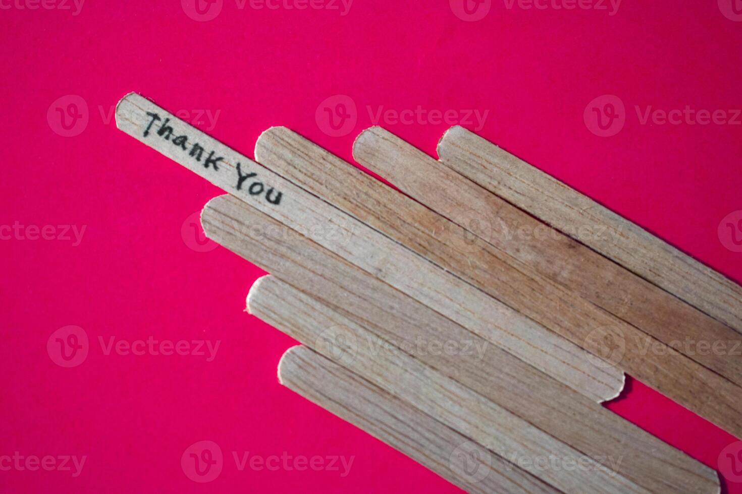 stick of ice cream with the words Thank you. Motivational quotes, optimism, positive words. Isolated on background photo