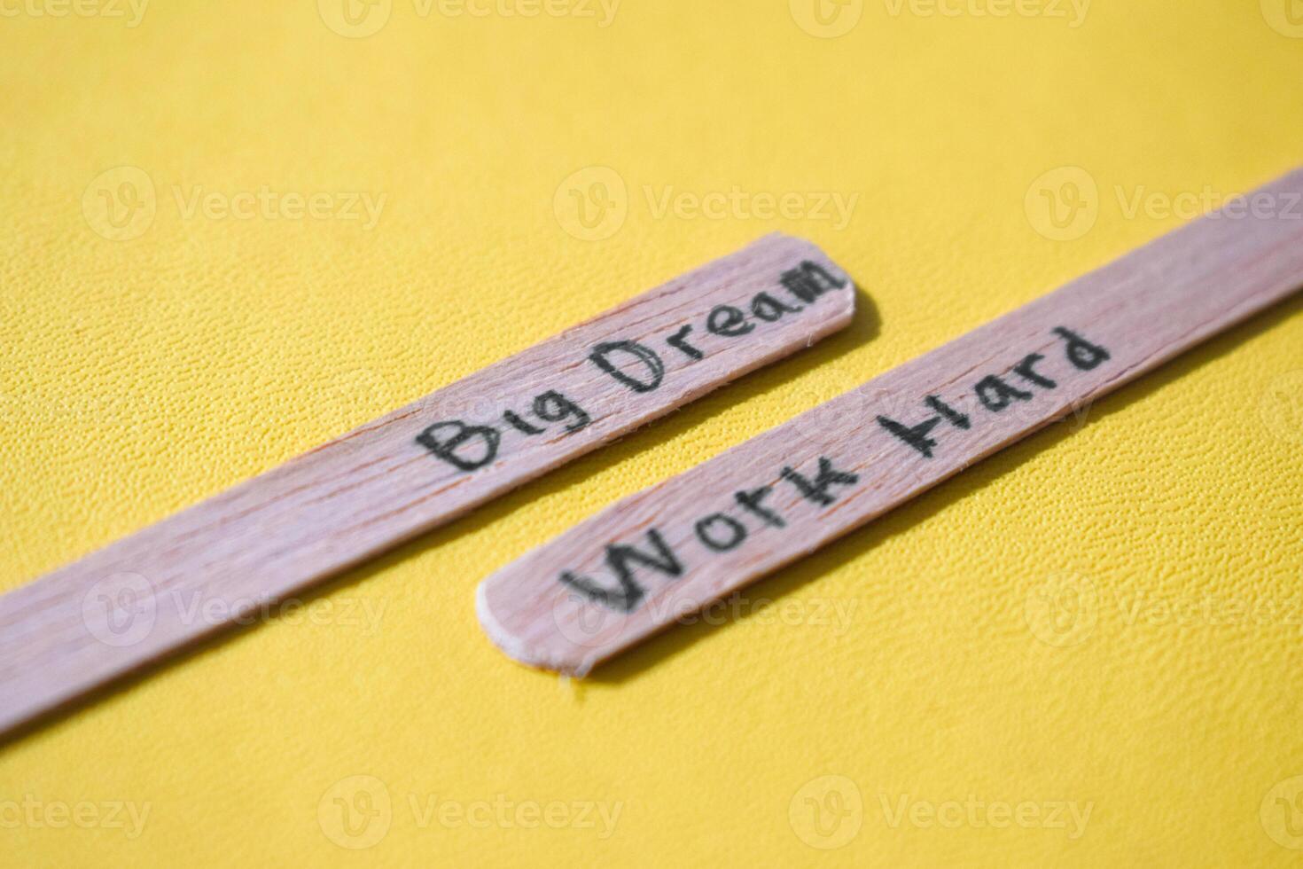 stick of ice cream with the words Big Dream, Work Hard. Motivational quotes, optimism, positive words. Isolated on background photo