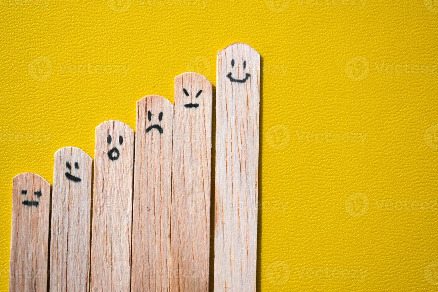 stick of ice cream with expression emotion, smile, angry, surprise. Motivational quotes, optimism, positive words. Isolated on background photo