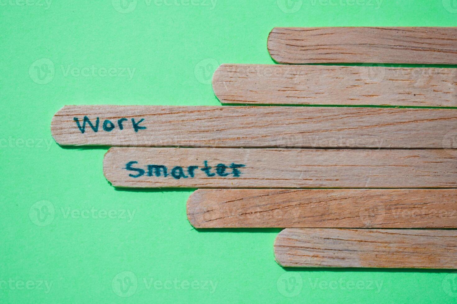 stick of ice cream with the words work smarter, motivational quotes, optimism, positive words. Isolated on background photo