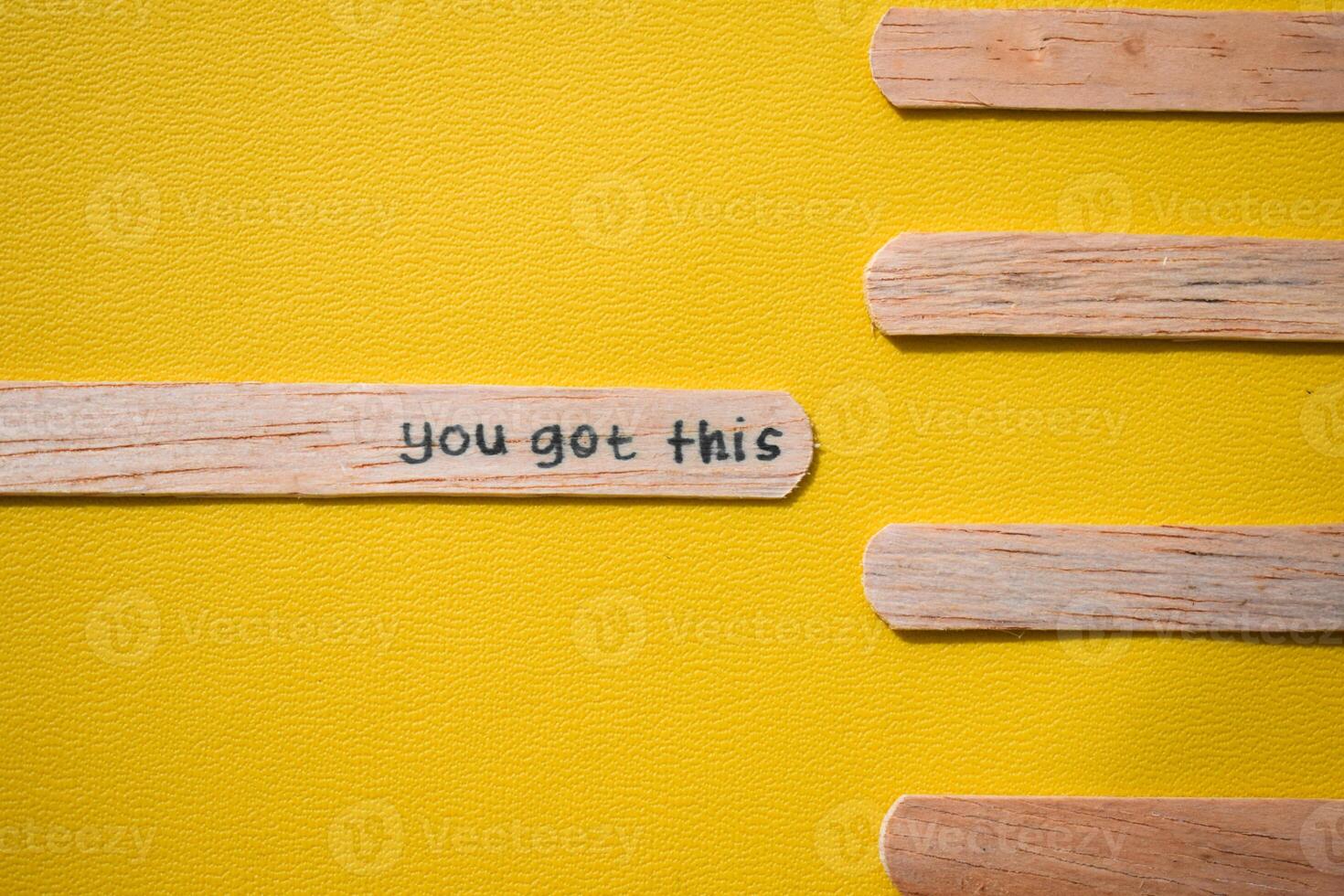 stick of ice cream with the words you got this. Motivational quotes, optimism, positive words. Isolated on background photo