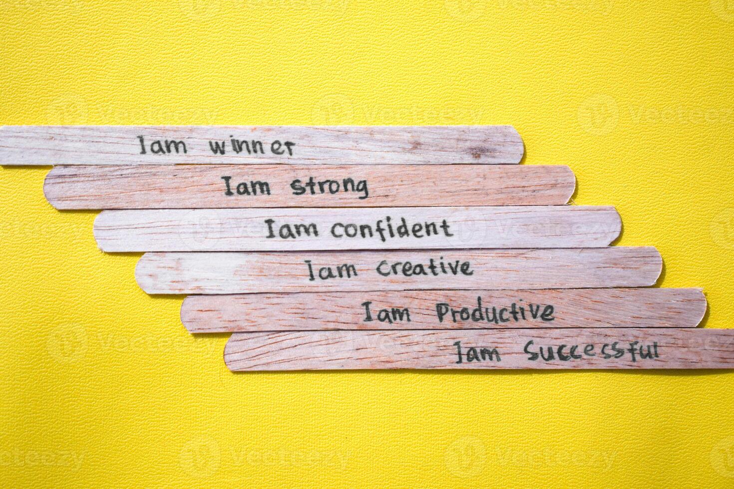 stick of ice cream with the words I am winner, strong, confident, creative, productive, successful. Motivational, optimism, positive words photo