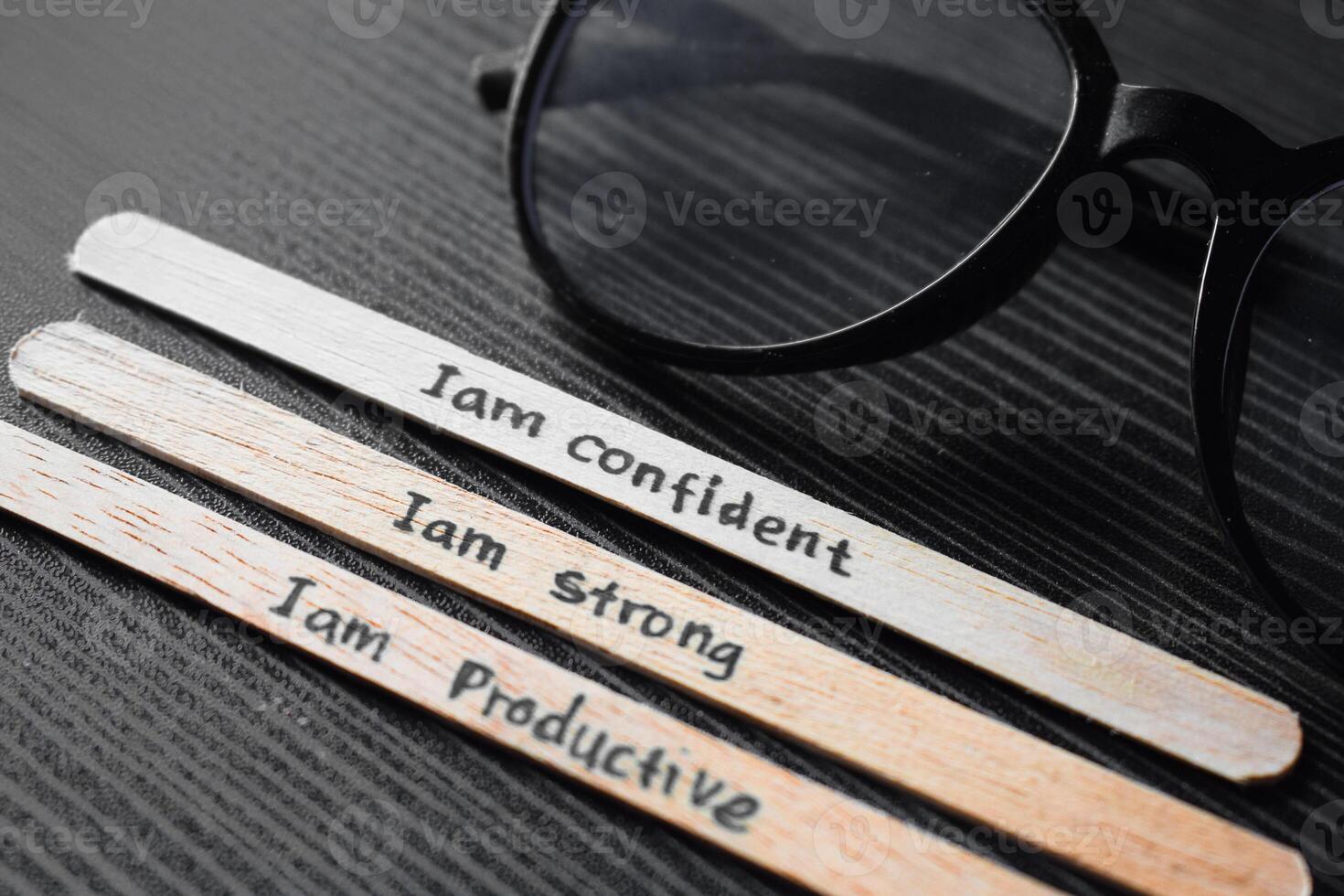 stick of ice cream with the words I am confident, strong, productive, successful. Motivational quotes, optimism, positive words photo