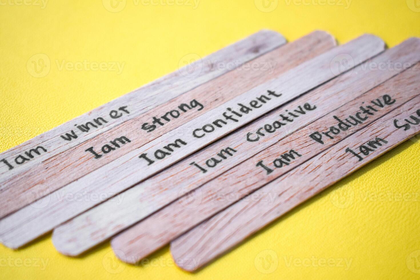 stick of ice cream with the words I am winner, strong, confident, creative, productive, successful. Motivational quotes, optimism, positive words photo