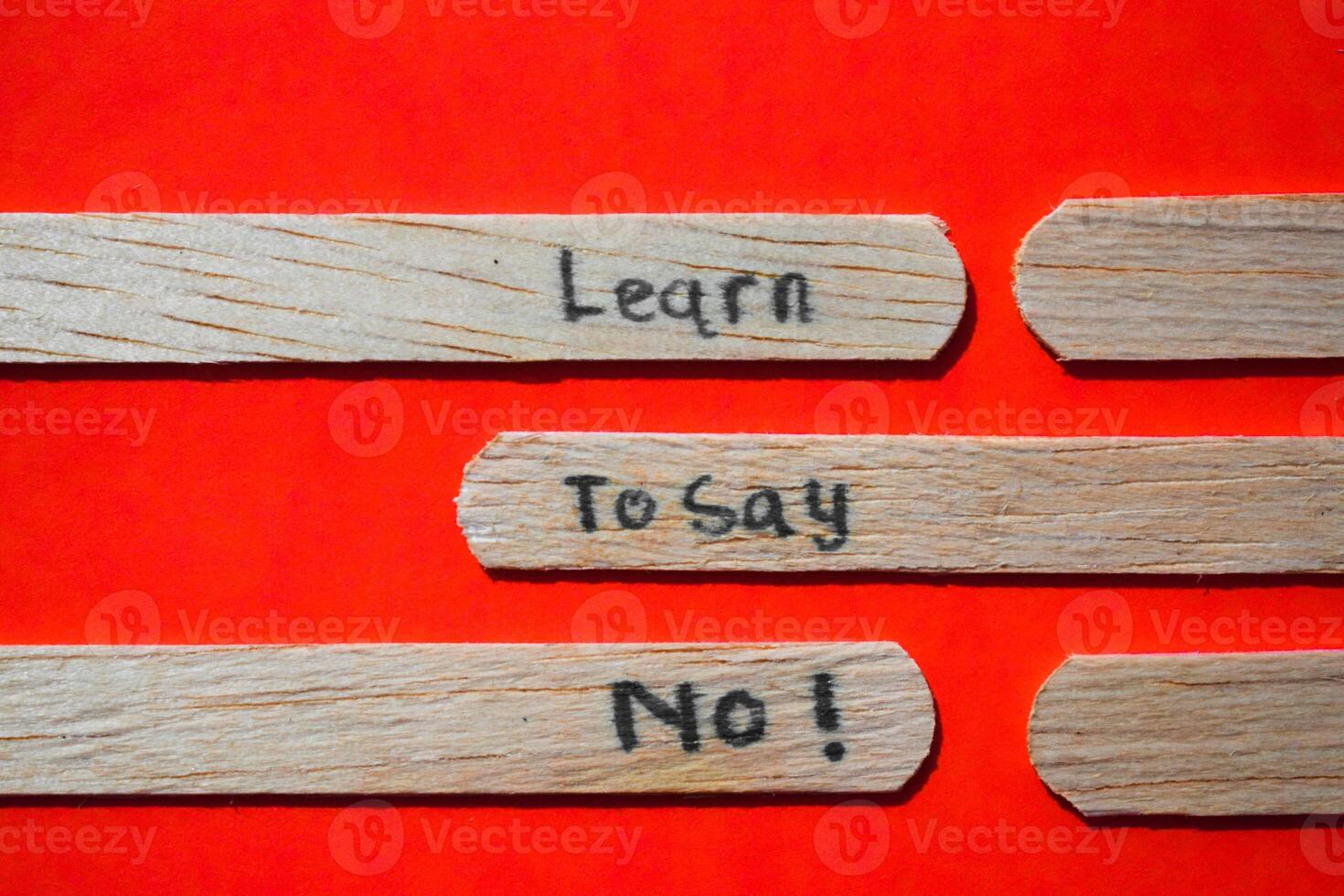 stick of ice cream with the words Learn to say No. Motivational quotes, optimism, positive words. Isolated on background photo
