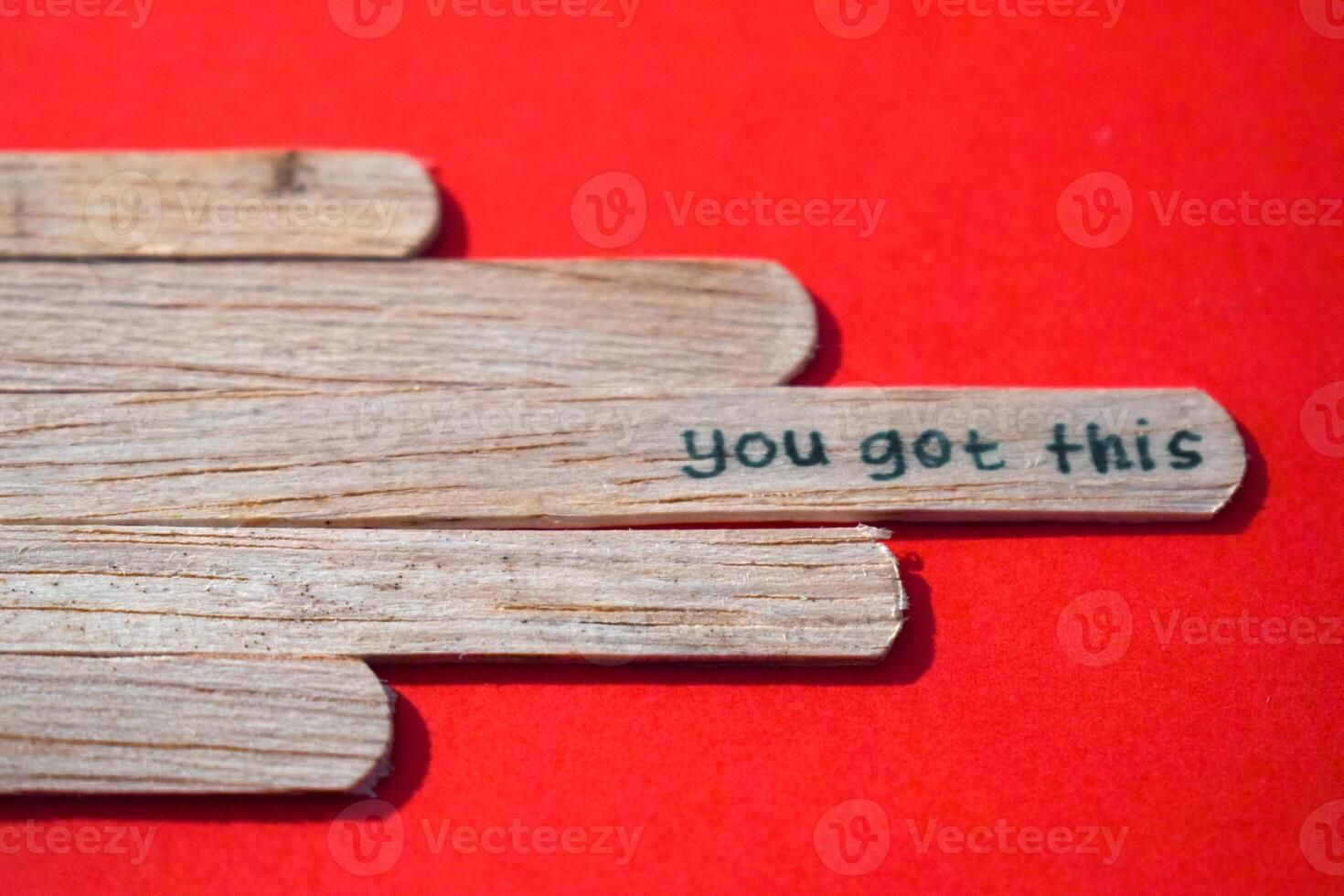 stick of ice cream with the words you got this. Motivational quotes, optimism, positive words. Isolated on background photo