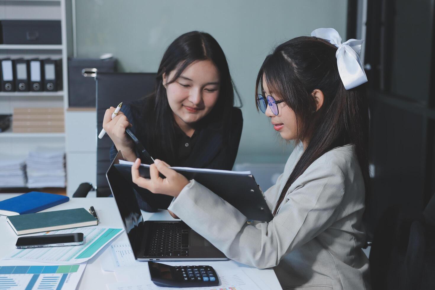 Team of business people are meeting to analyze data for marketing plan,Market research reports and income statistics, Financial and Accounting concept. photo