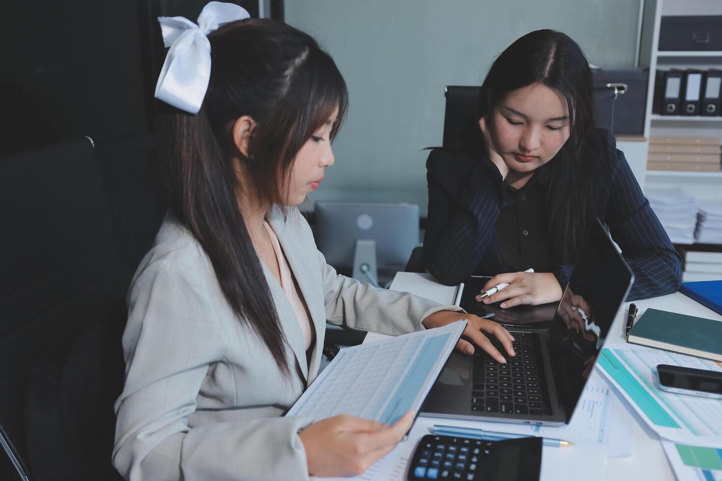 Team of business people are meeting to analyze data for marketing plan,Market research reports and income statistics, Financial and Accounting concept. photo