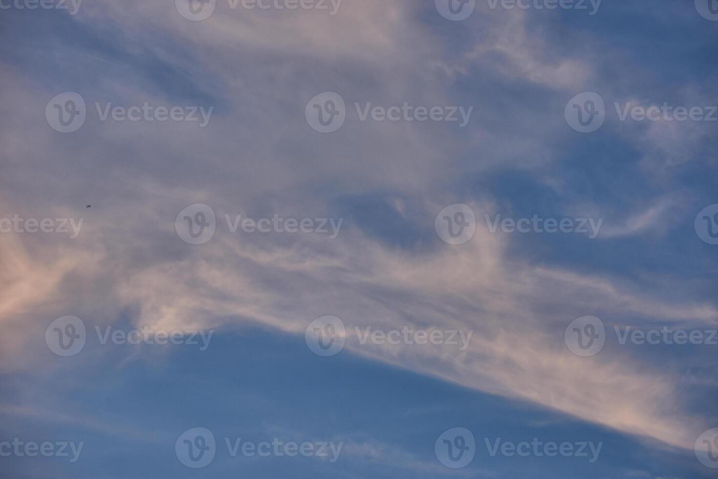 White clouds on blue sky background in the sunny afternoon photo