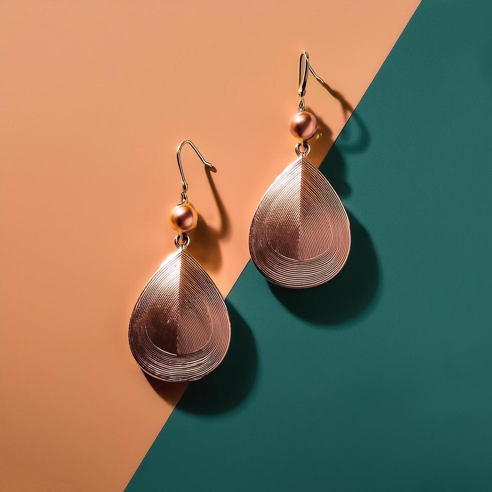 Minimalist Jewelry. Simple earrings placed on a minimalist background photo