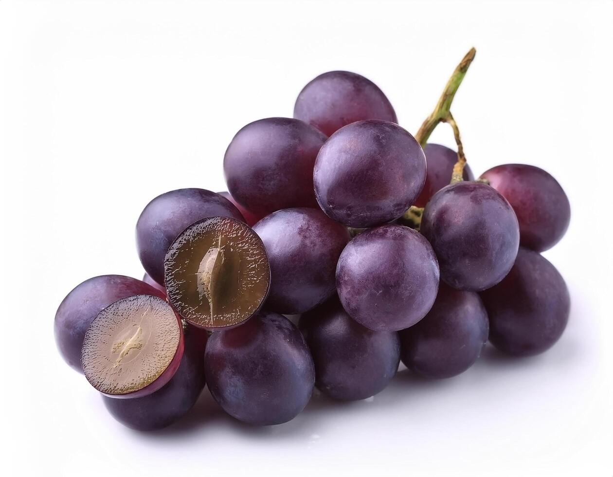 A bunch of purple grapes with one separate grain, focus on the skin texture isolated on white background photo