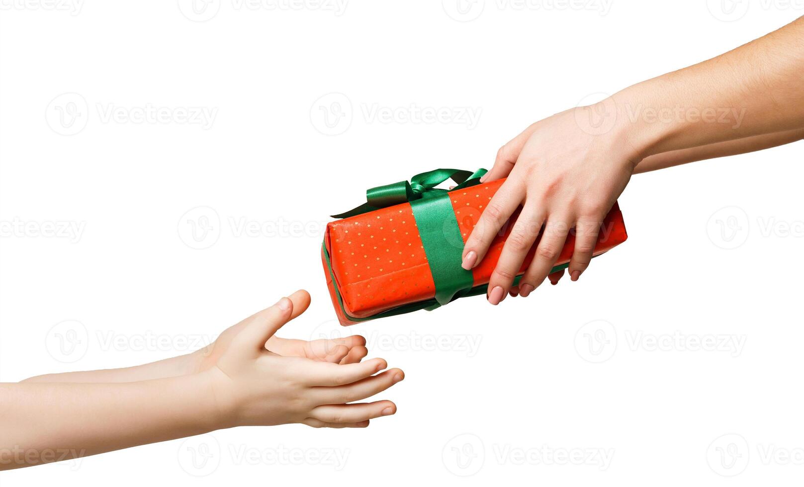Female hand give gift box to kid, mother greeting her child, isolated on white background, close-up, cutout. Holiday present, celebration concept photo