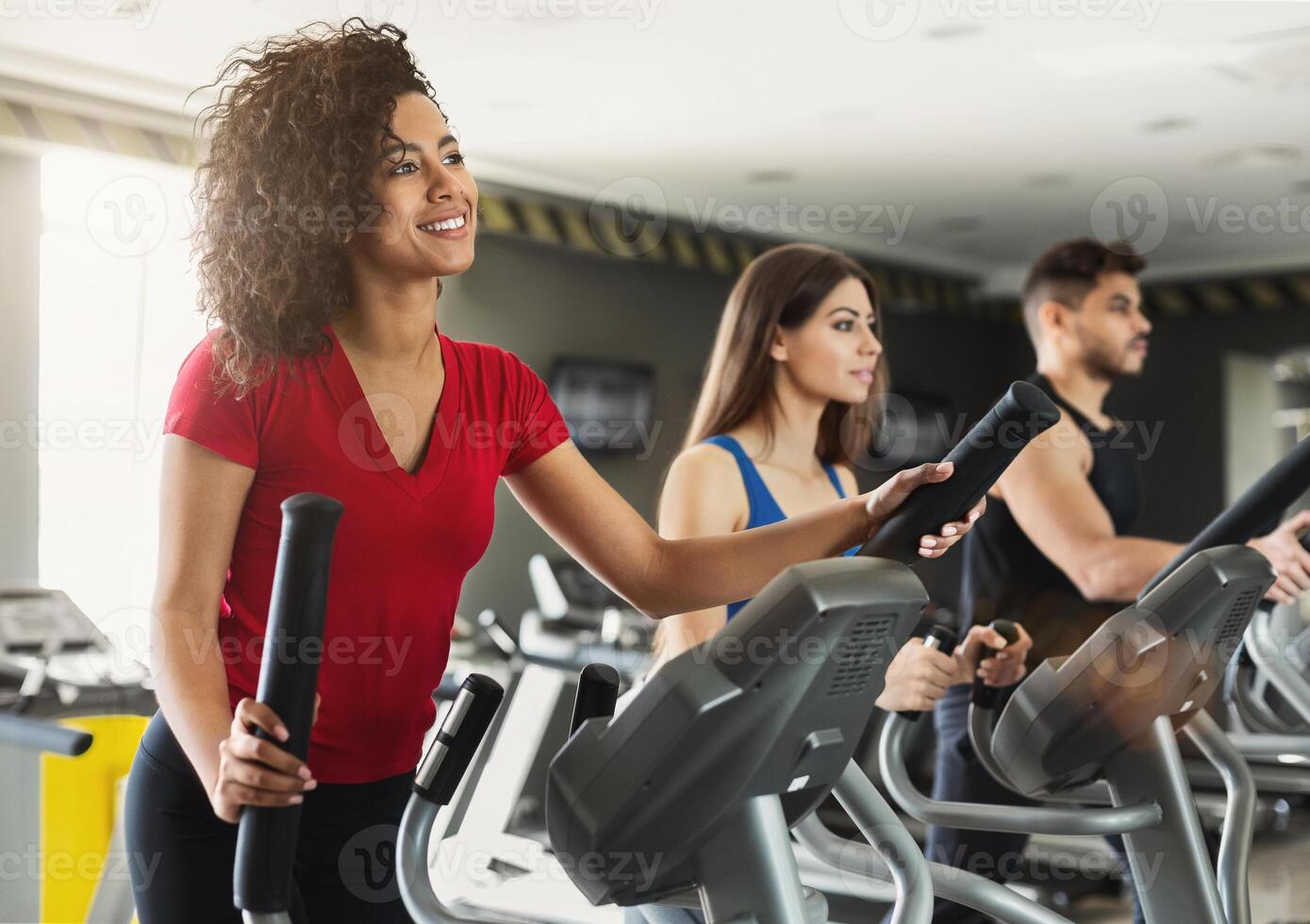 Group cardio training on treadmill photo