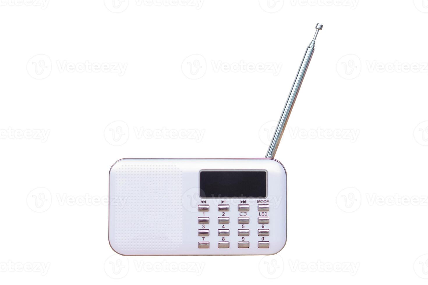 Mini portable radio, isolated on white background. Concept, audio electronics for listening to music, songs or news from radio wave channel station. Analog amplifier for relaxation and lifestyle. photo