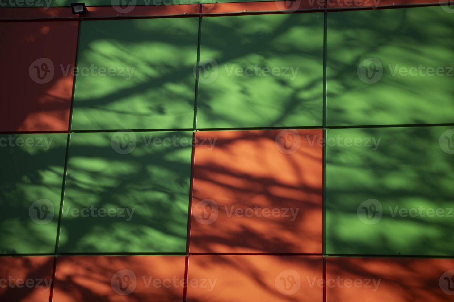 Shadow on the wall. Building detail. Supermarket in detail. photo
