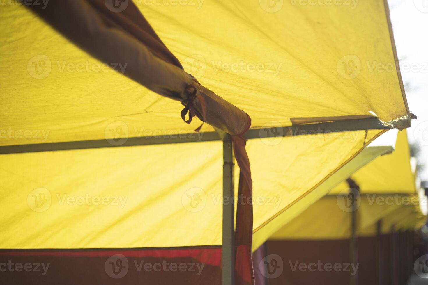A market stall. Empty market. Tents stand in a row. Place for the fair. photo
