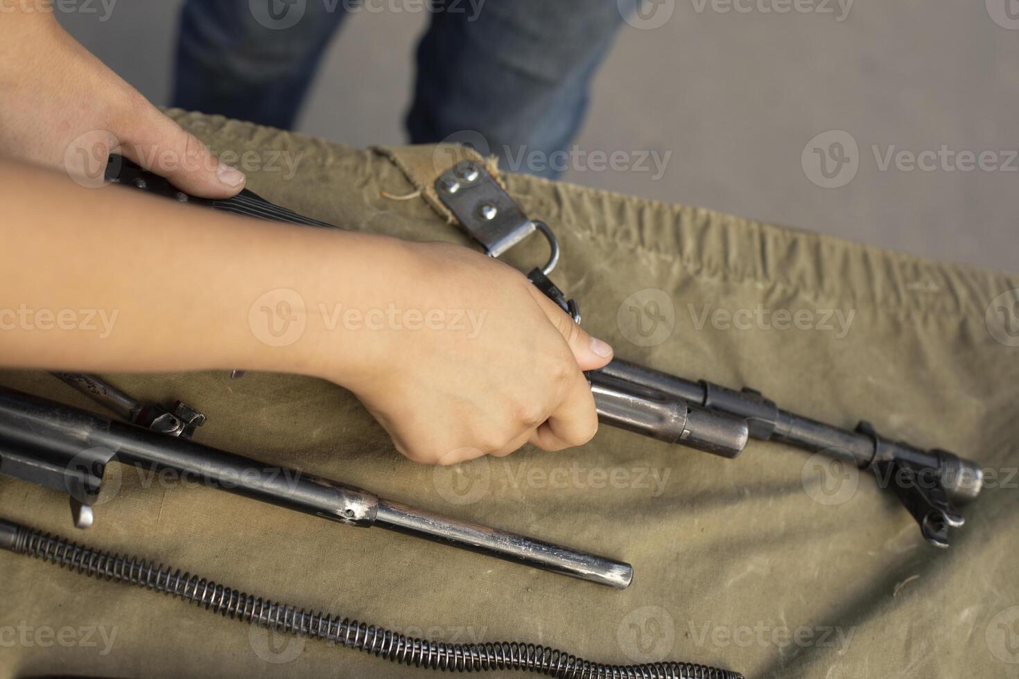 Military training. Assembly of automatic weapons. Military skills training. photo