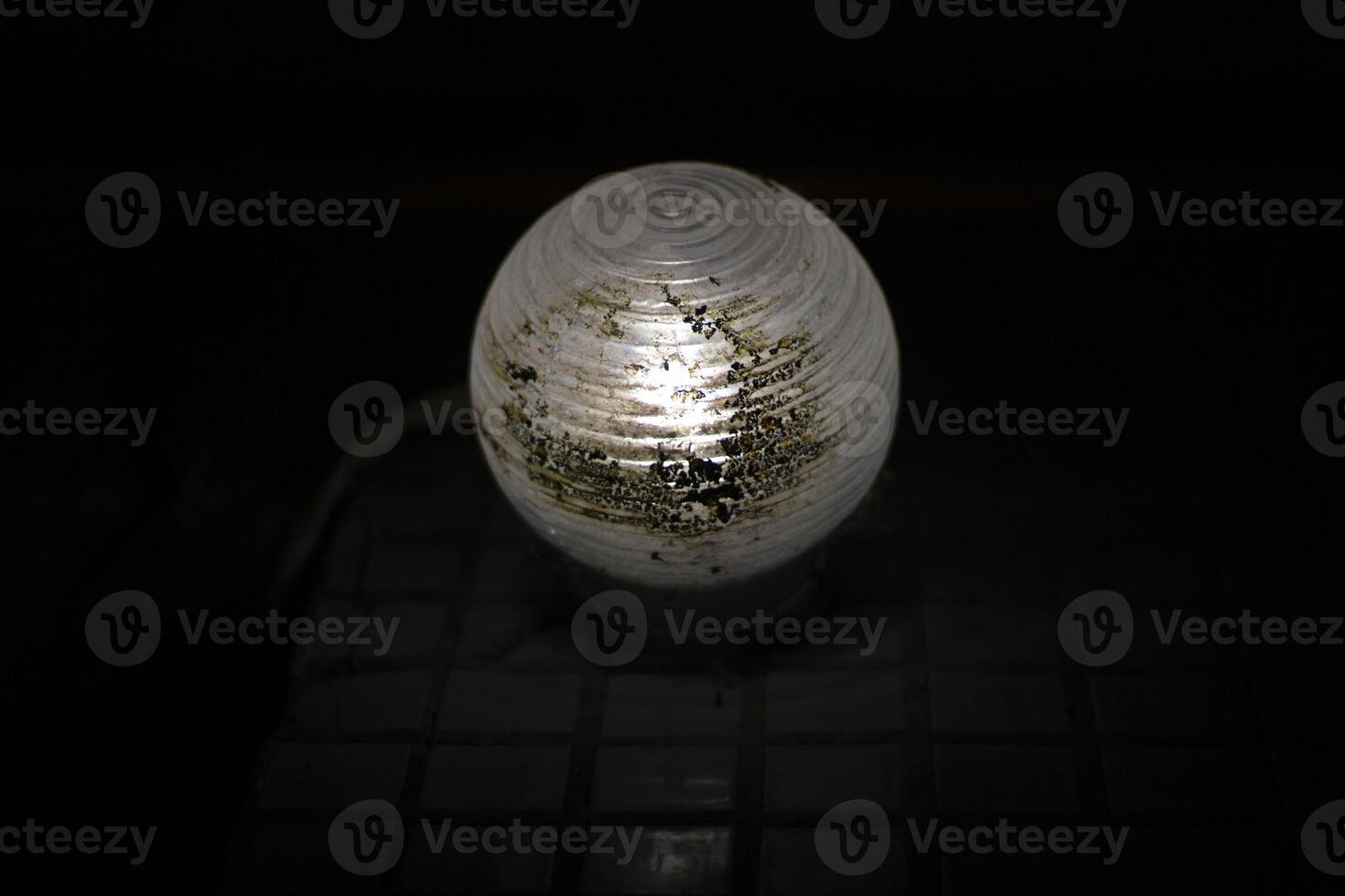 Lamp light. Lamp indoors. Low light. photo
