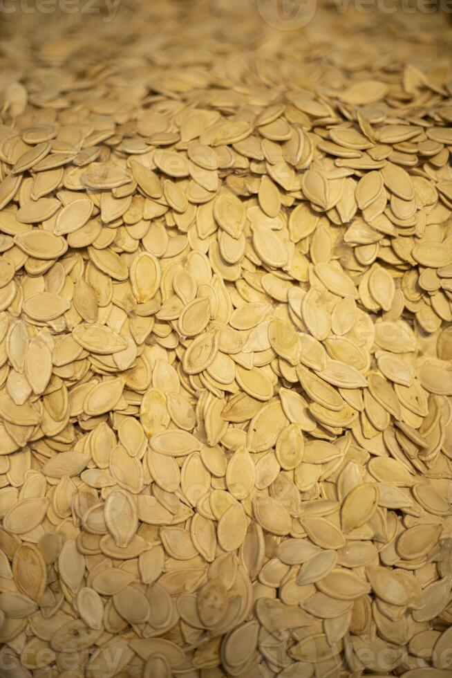 Sale of nuts. There are a lot of nuts on the market. Fruit stand. photo