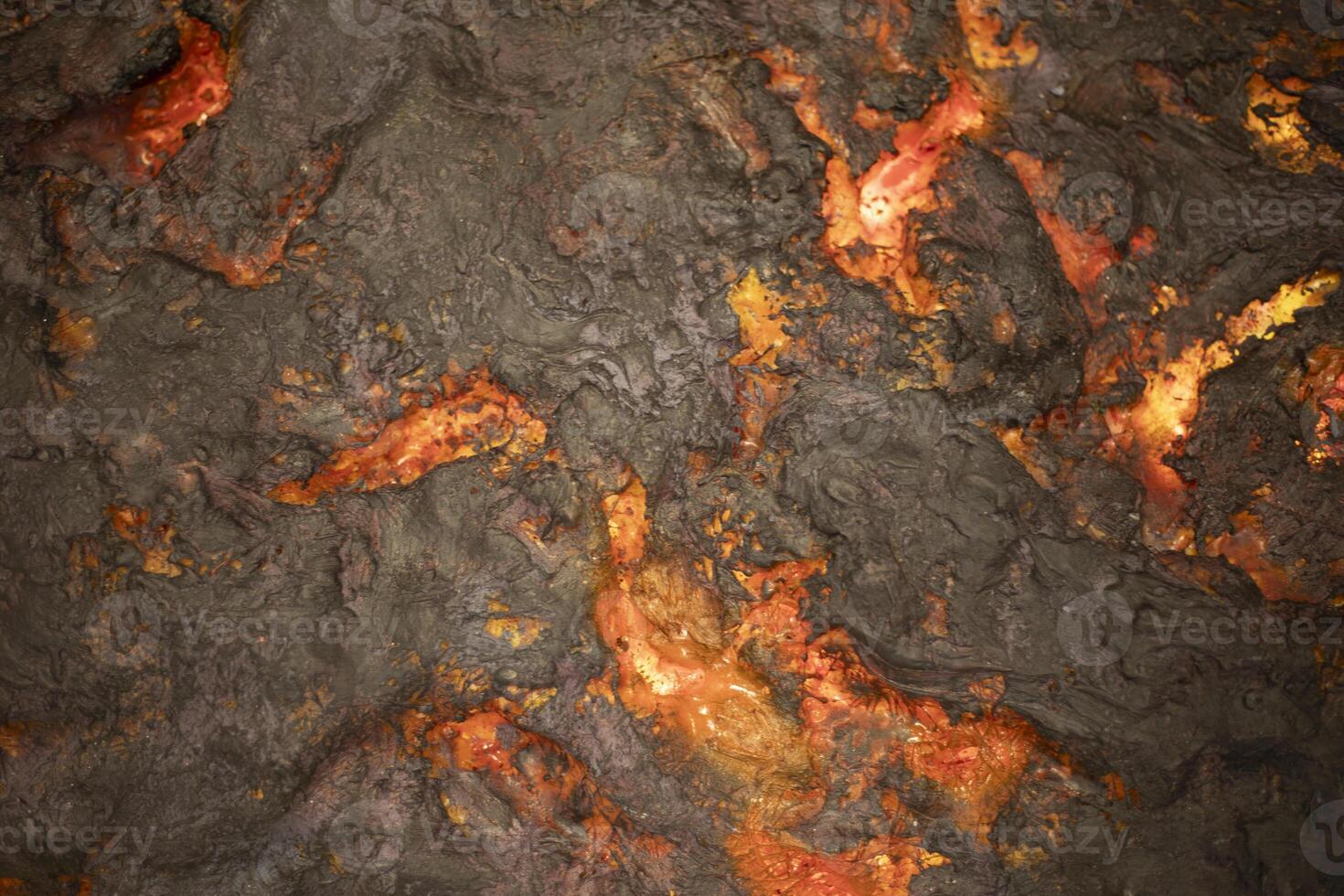 Fire lava. Hot stream. Lava flow. photo