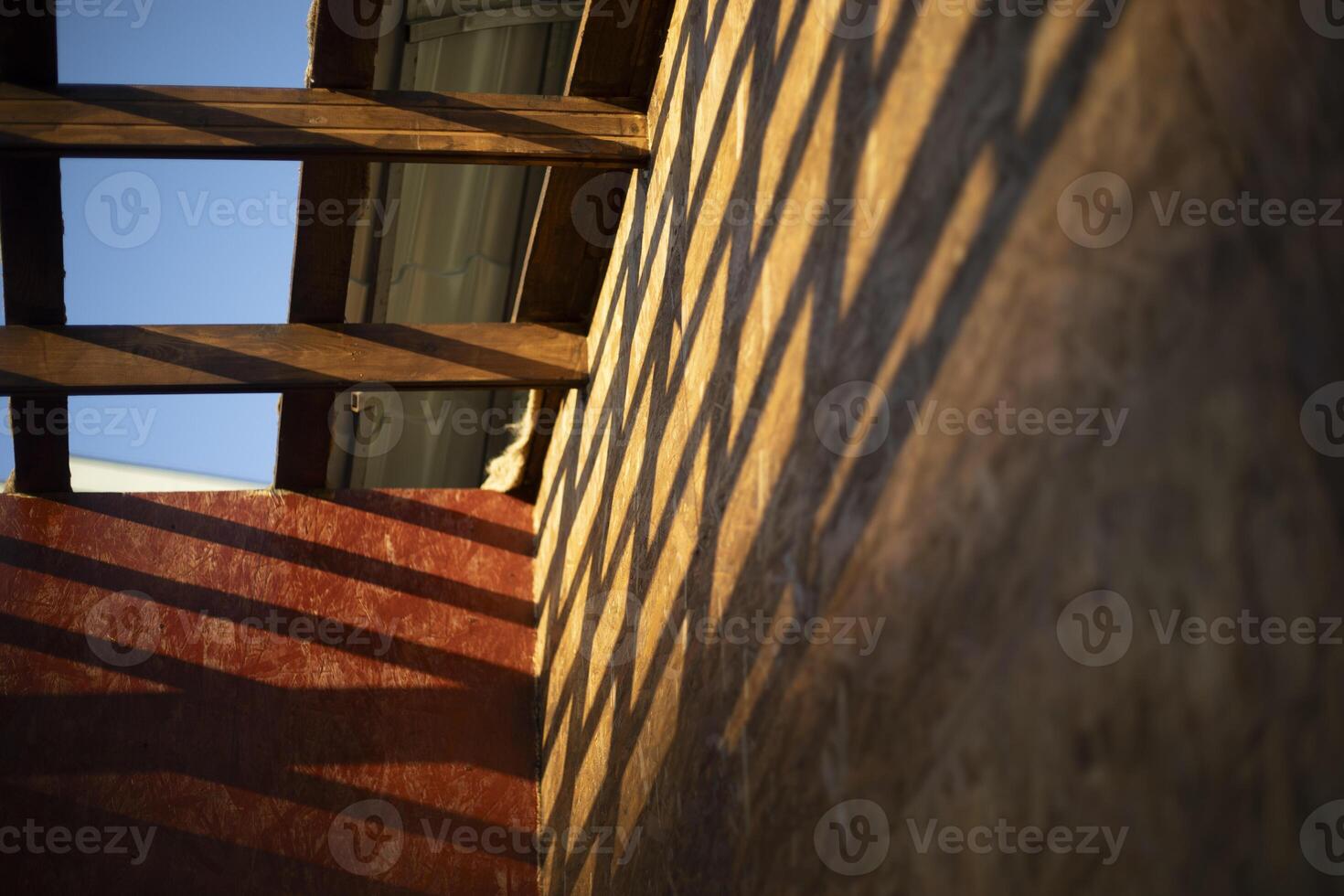Wooden building. Veranda in the house. Summer construction. photo
