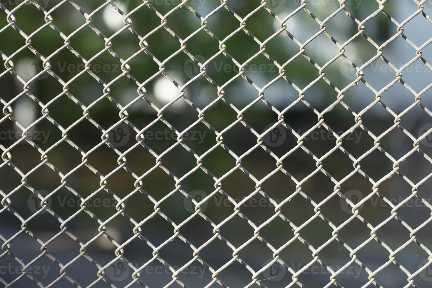 Lattice fence. Steel grating. Steel mesh. Repeating element. photo