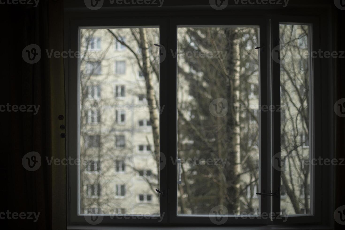 The view from the window. Window in the apartment. Interior details. photo