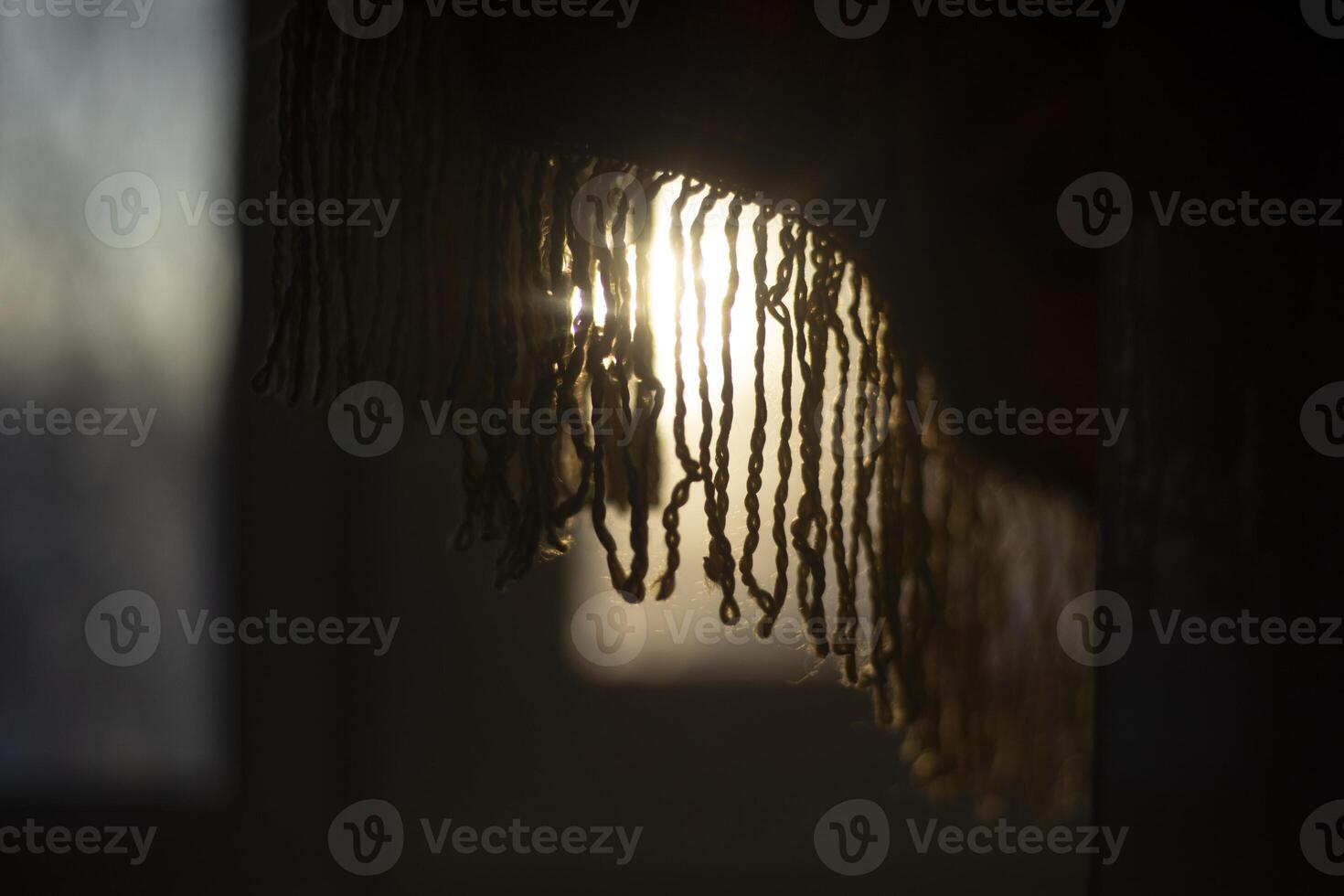 Light from the window. Fabric in rays of light. Morning rays. photo