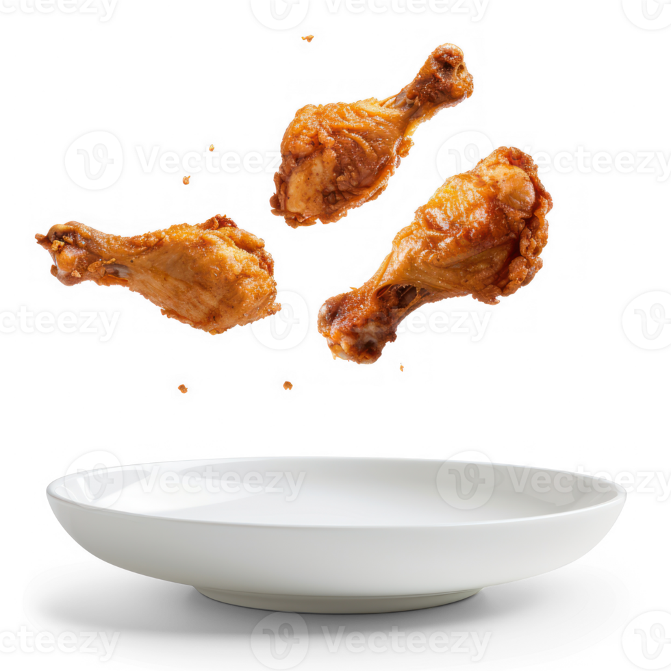 floated Fried chicken legs falling into the white plate isolate on transparency background png