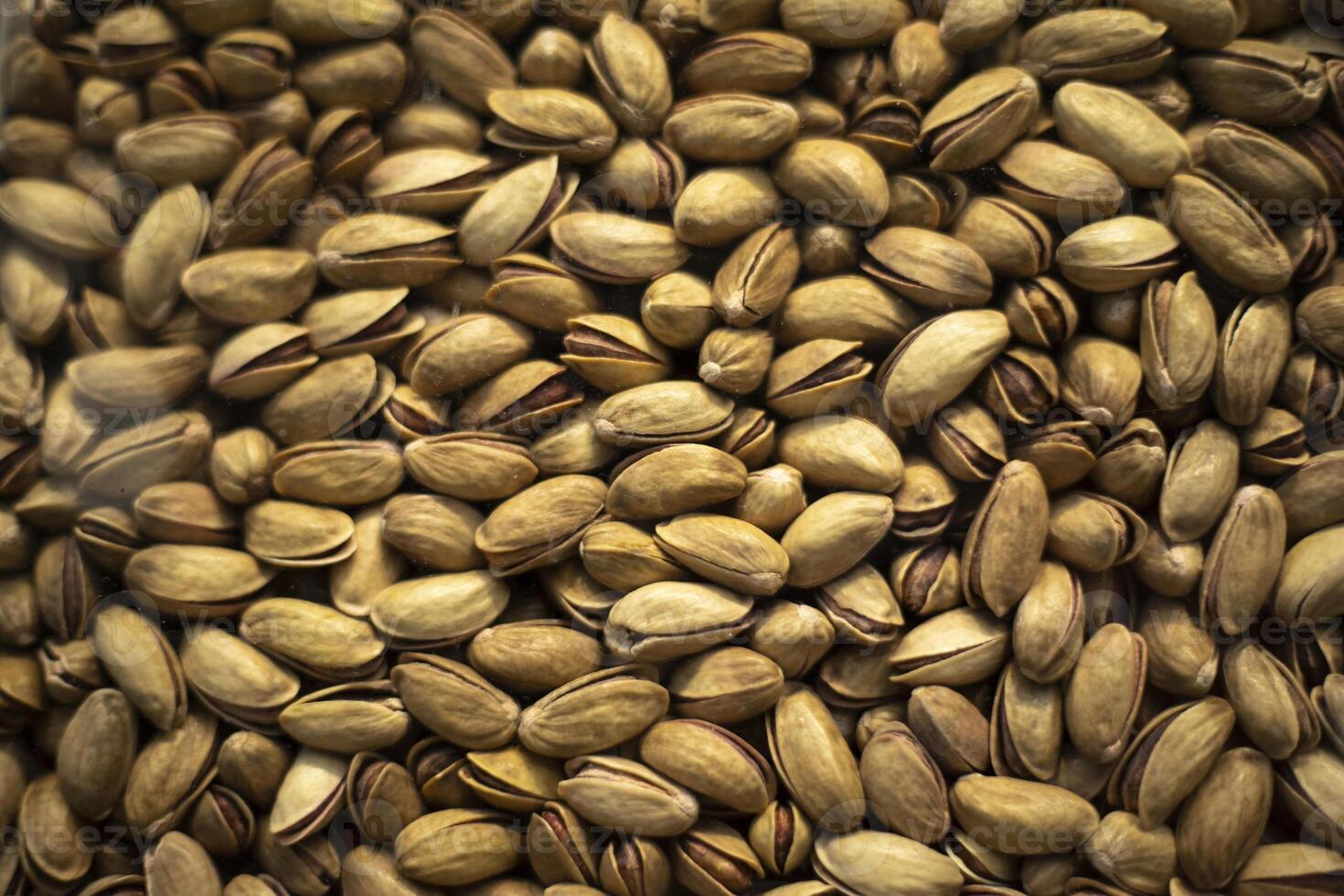 Pistachio texture. Sale of nuts. Roasted pistachios. photo