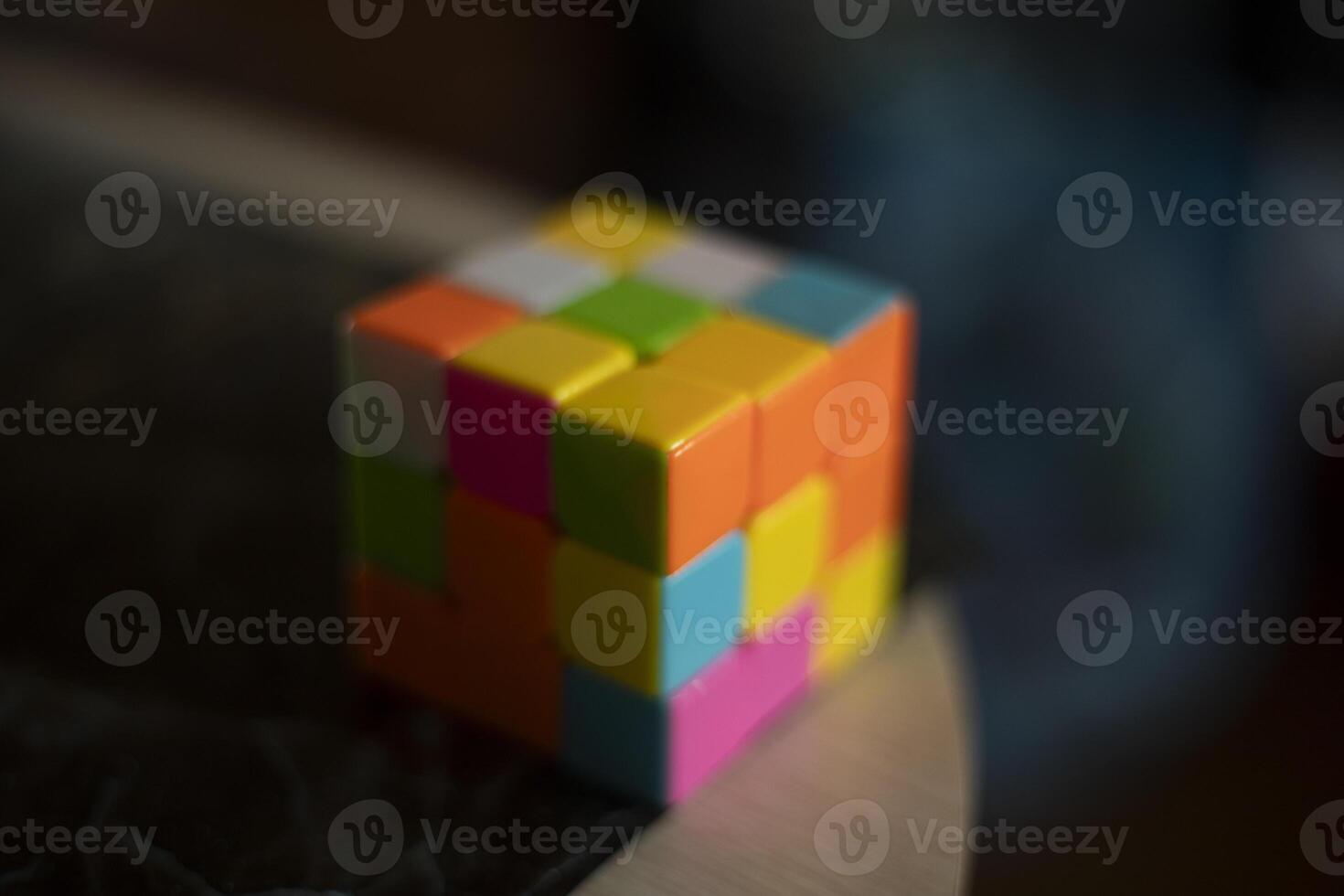 Intellectual game. Cube made of different colored tiles. A game for the mind. photo
