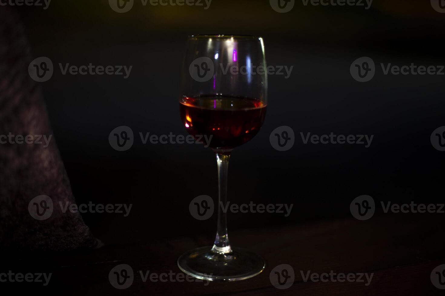 A glass of wine. Drink in a glass. Alcoholic beverage. photo