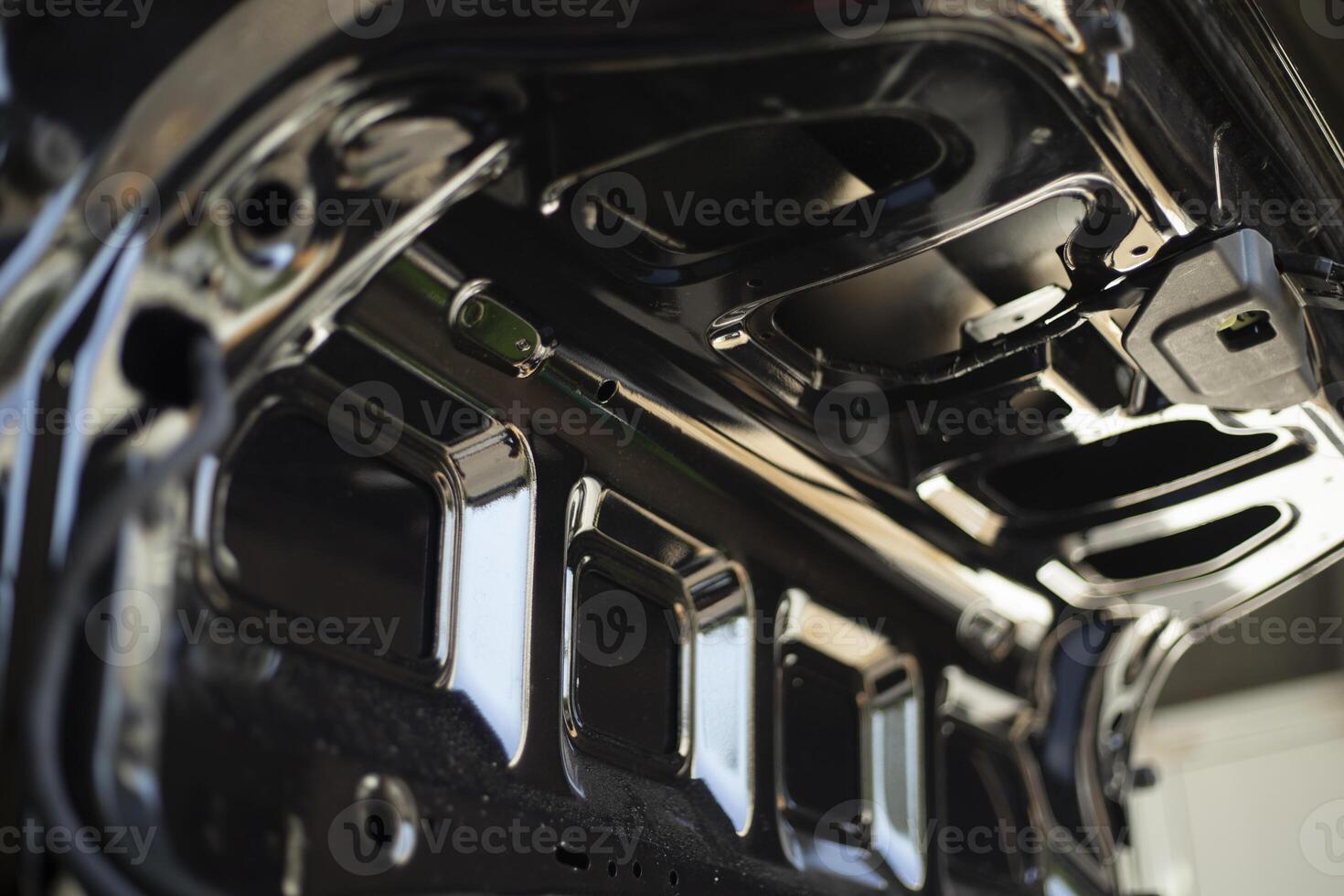 Truck body inside. Black steel machine. Transport interior details. photo