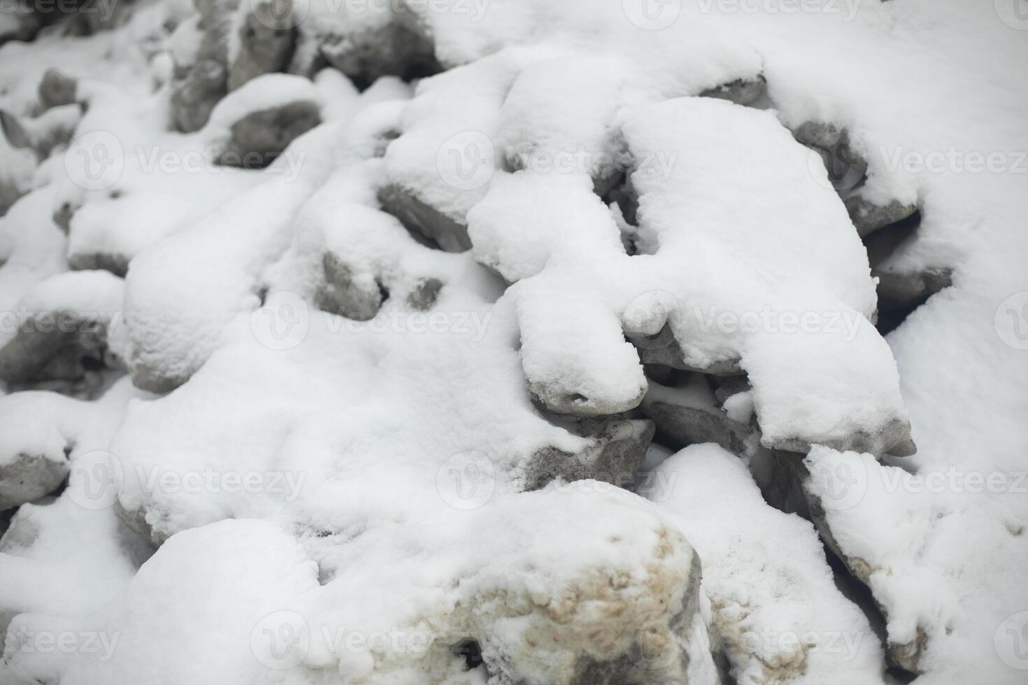 Frozen snow. Ice Blocks. Piled up snow. photo