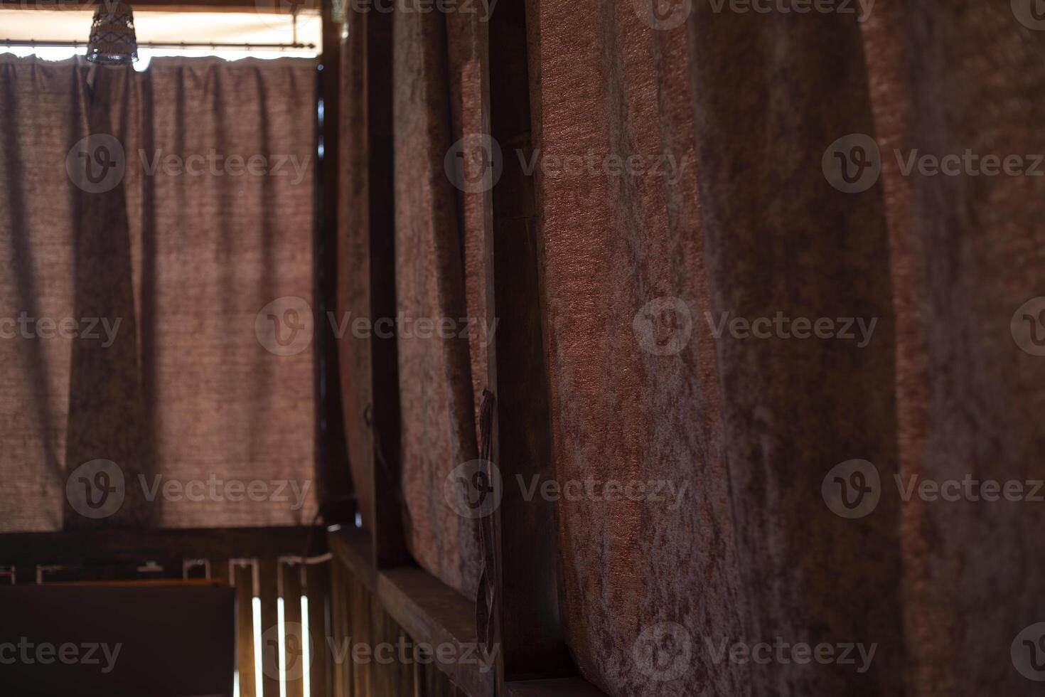 Curtains on the veranda. Veranda made of wood. Interior with large windows. photo