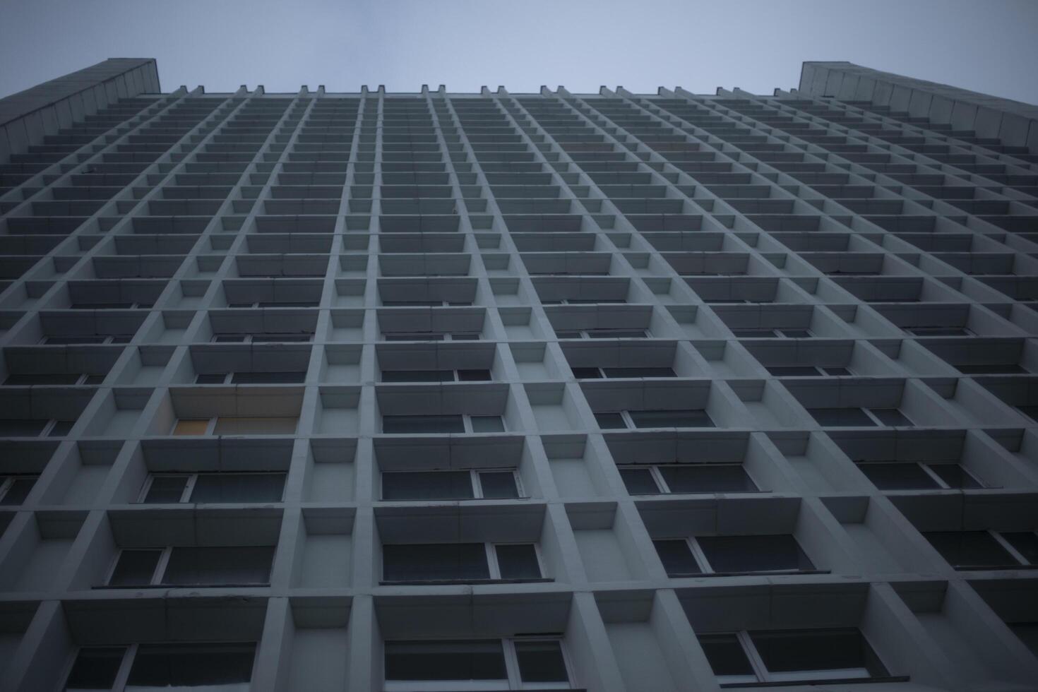 Windows of skyscraper. Tall building. Large office. Architecture details. photo
