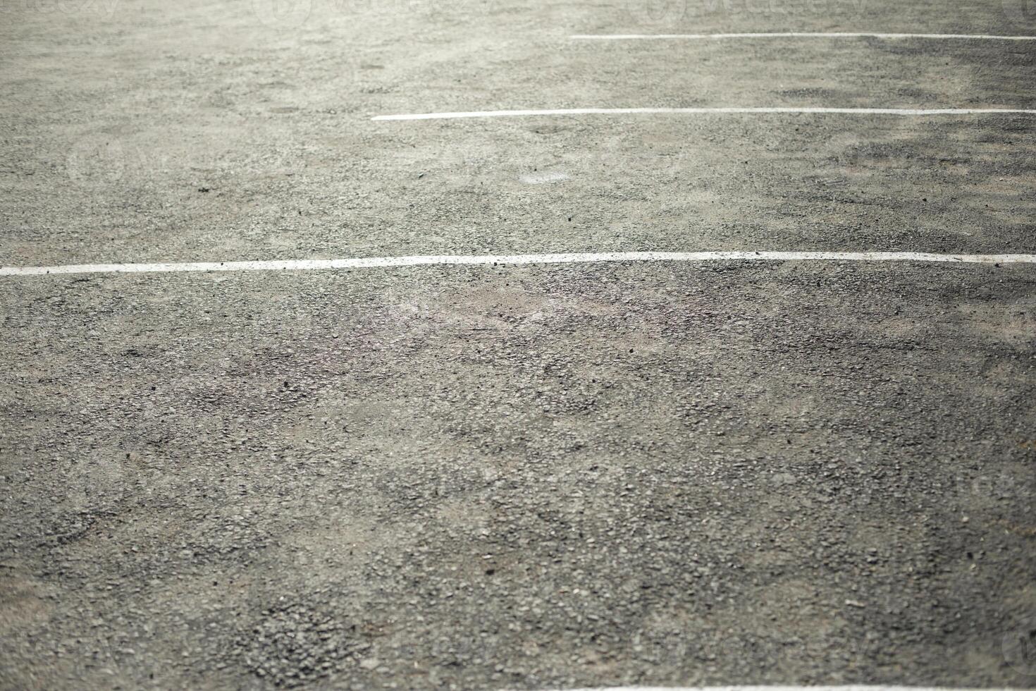 Parking spaces on asphalt. Empty spaces for transport. White markings on asphalt. photo