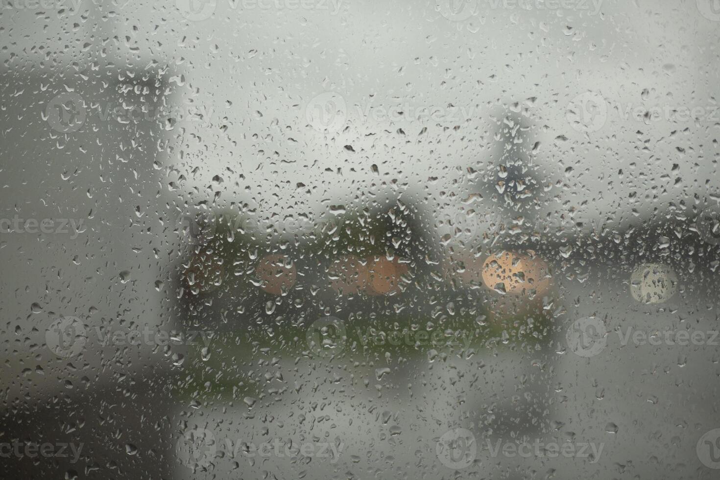 Wet glass. Raindrops on window. It's rainy day. photo