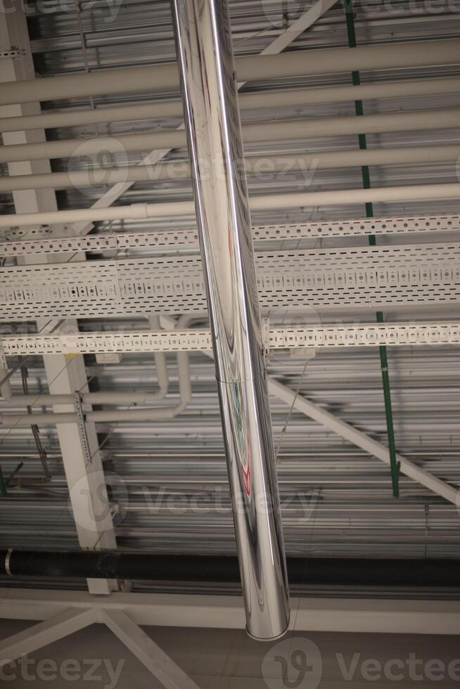 Ceiling in a warehouse. Roofing in a warehouse. Interior of a trading floor. photo