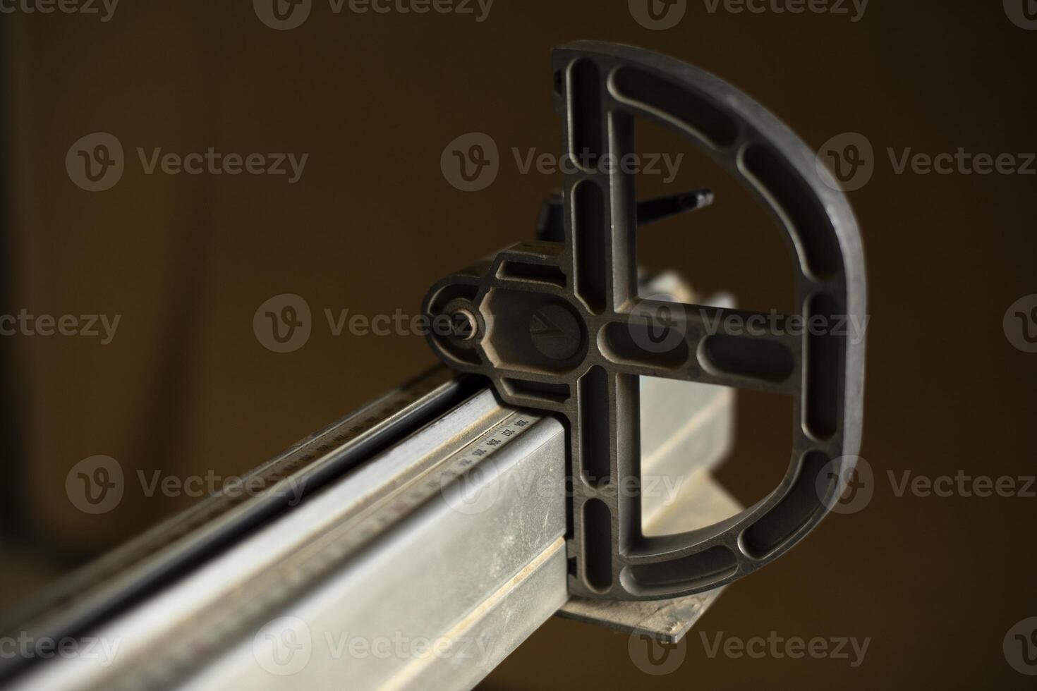 Rail guide on the machine. Ruler on the machine. Technical equipment for sawing materials. photo