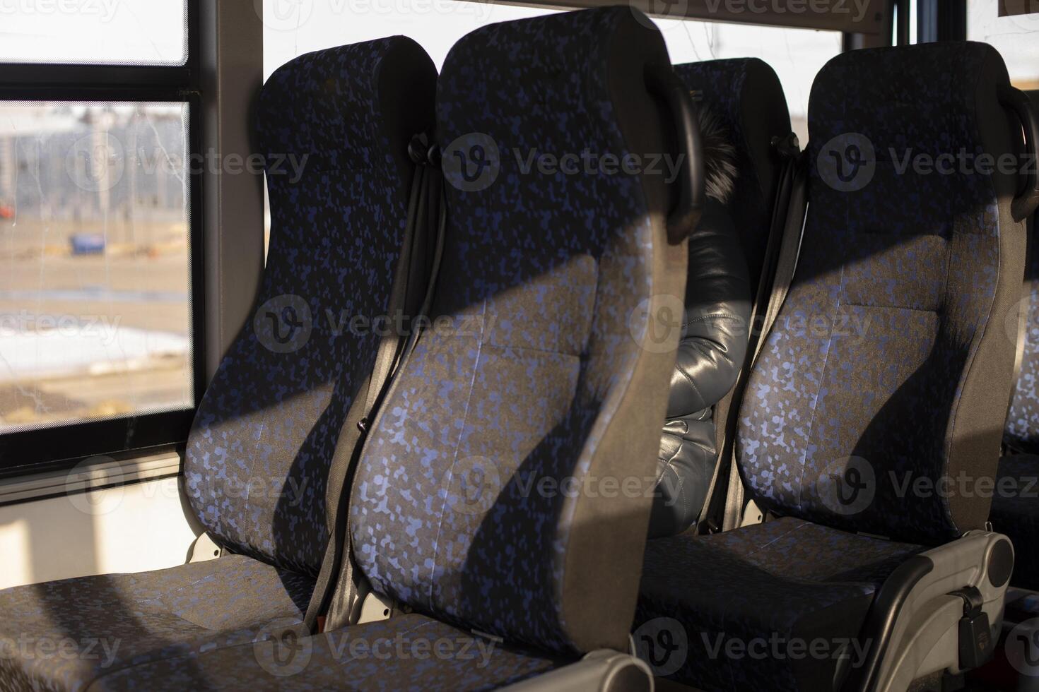 Seat on bus. Space for passengers. photo