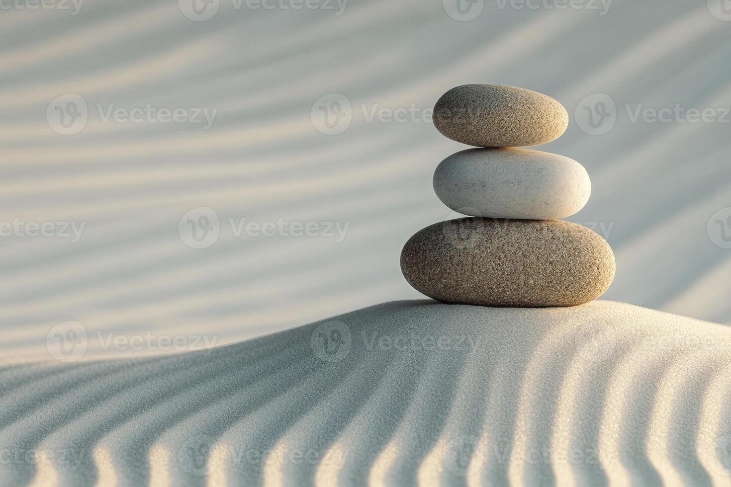 A stack of stones in the sand dunes photo