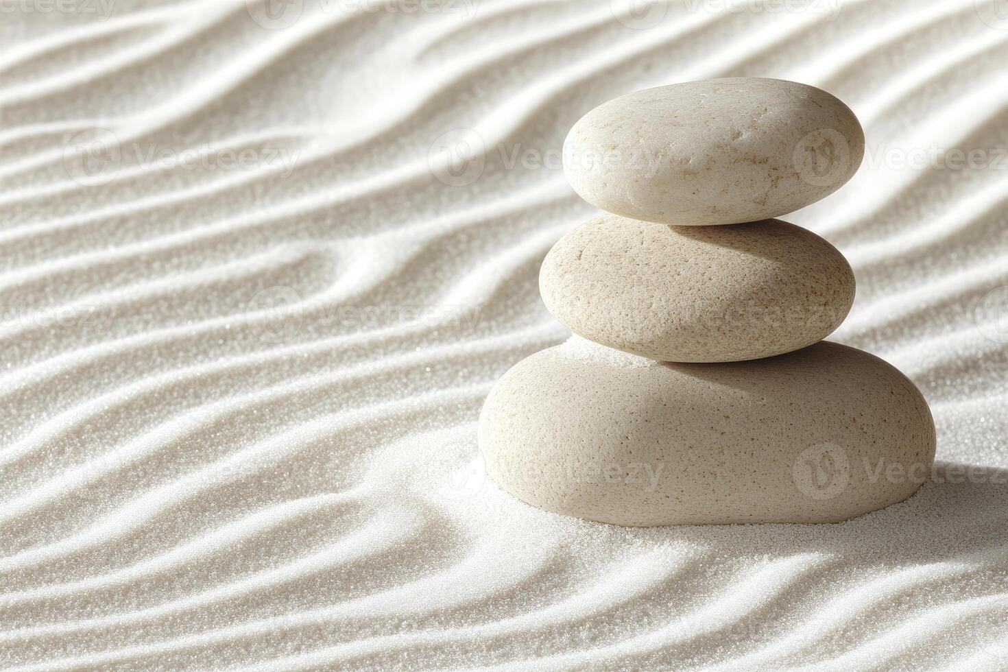 A stack of stones in the sand photo
