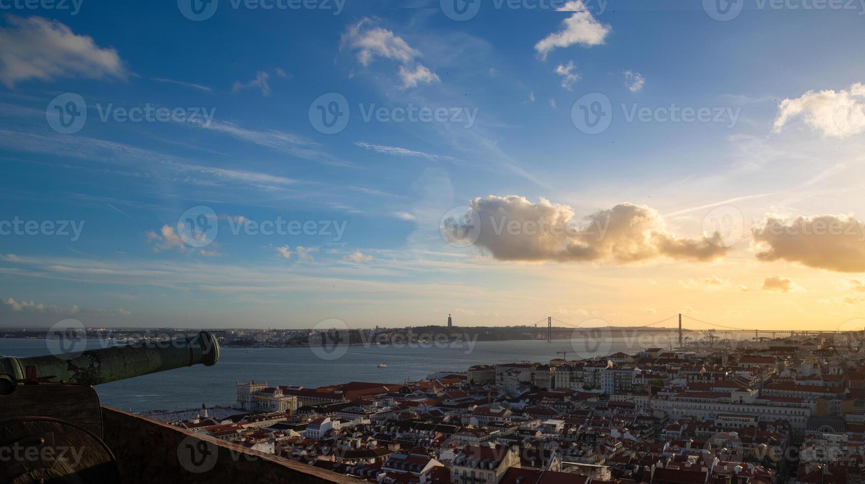 Scenic panoramic views of Lisbon and 25 of April bridge from Saint George Castle Sao Jorge lookout photo