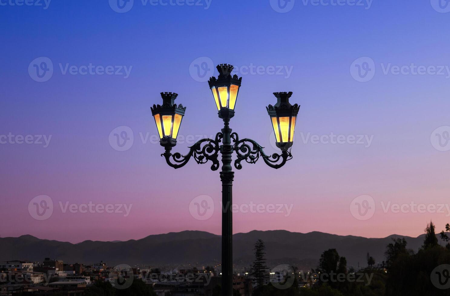 Arequipa, Peru. Sunset view of the Misti Volcano mountain range from the Yanahuara bridge photo