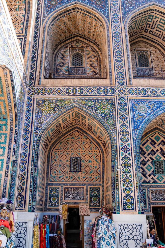 Samarkand, Uzbekistan-august 12, 2023-Particular of the Registan square occupied by a large complex made up of 3 madrasas photo