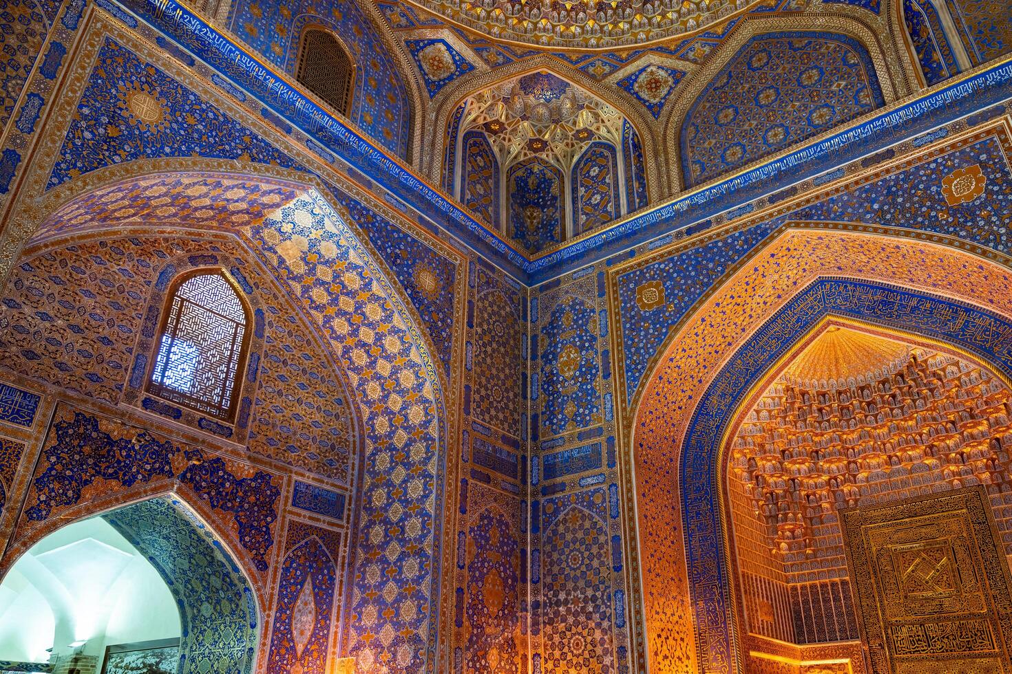 Samarkand, Uzbekistan-august 12, 2023-Interior of the Tilla-Kari Mosque in the Registan Square in Sammarkand during summer day photo